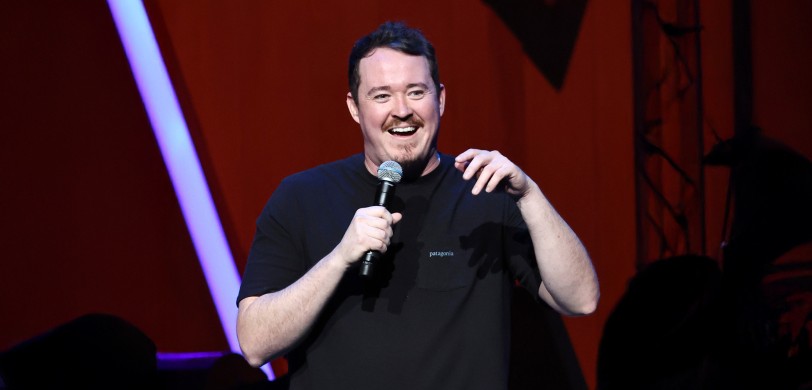 Comedian Shane Gillis performing on stage