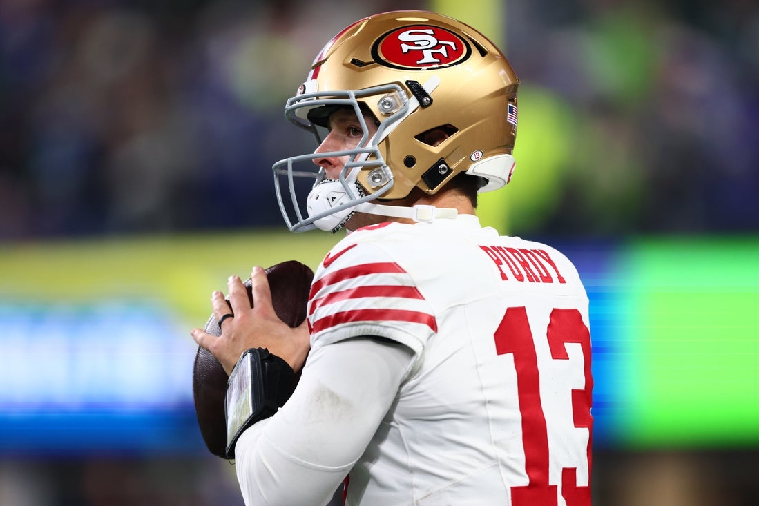 San Francisco 49ers quarterback Brock Purdy (13) scans the field.