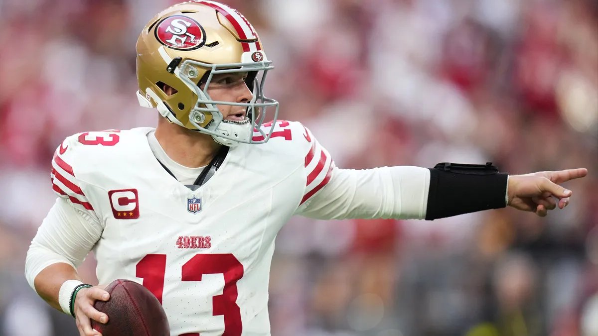 San Francisco 49ers quarterback Brock Purdy (13) in the white away uniform at Levi's Stadium