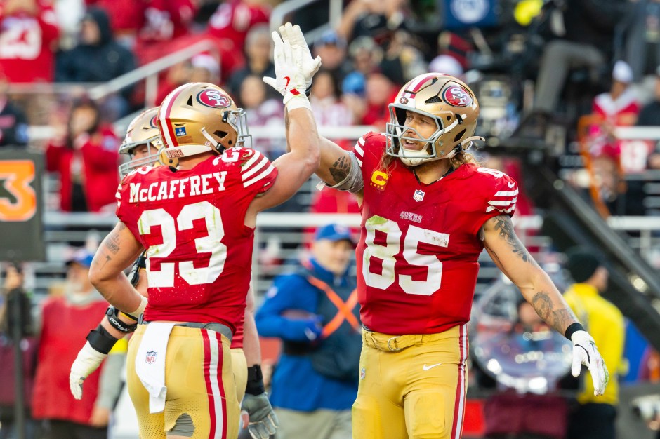 Christian McCaffrey (23) and George Kittle (85) of the San Francisco 49ers