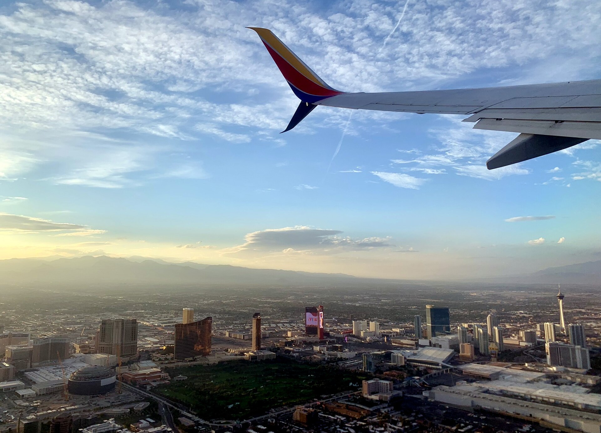 A daytime aerial view of the Las Vegas Strip — the new ballpark's roofline is becoming one of its defining features