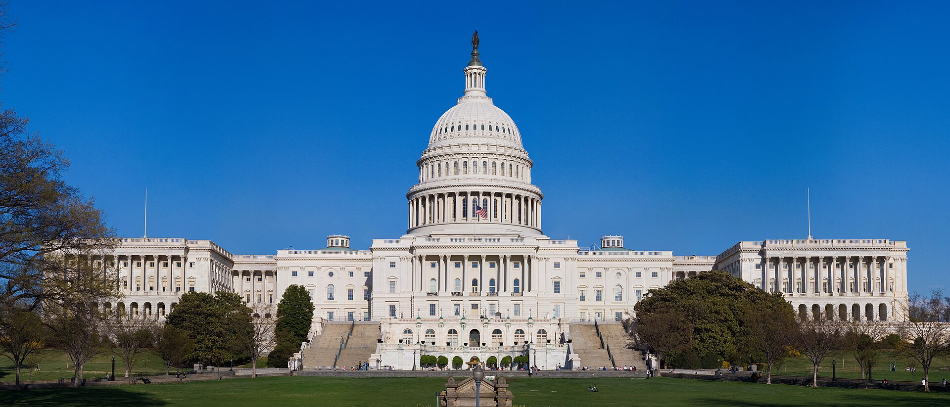 The U.S. Capitol dome and building on a clear day, seen from the National Mall