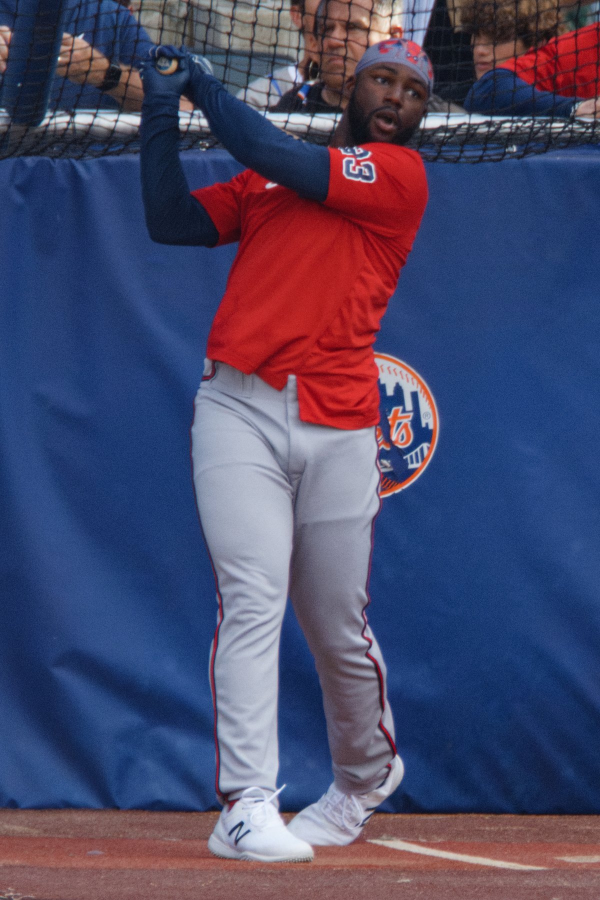 Michael Harris II takes batting practice in a Braves jersey.