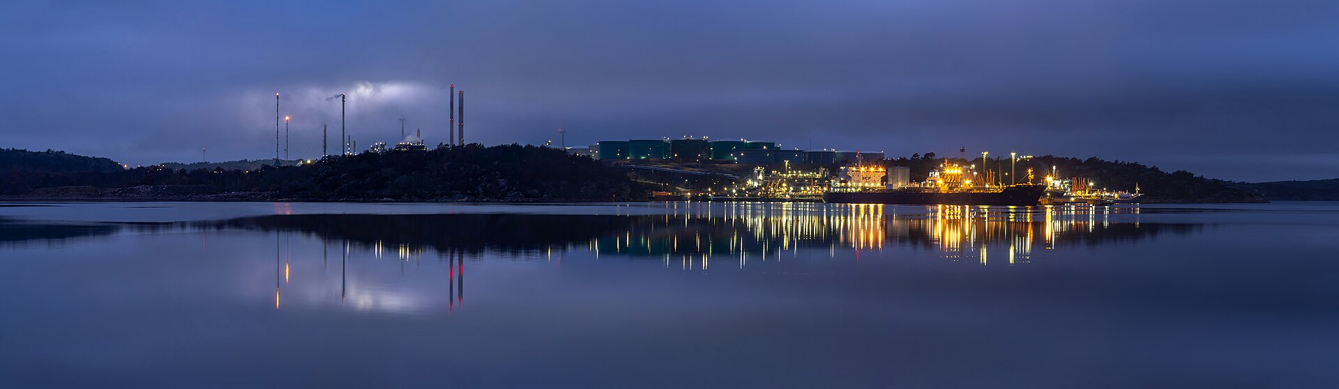 An oil refinery and a docked tanker at dusk (file photo)