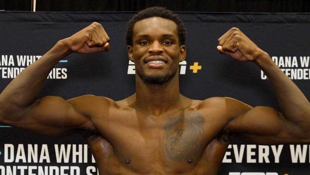 Damian Pinas flexes at the Dana White's Contender Series weigh-in