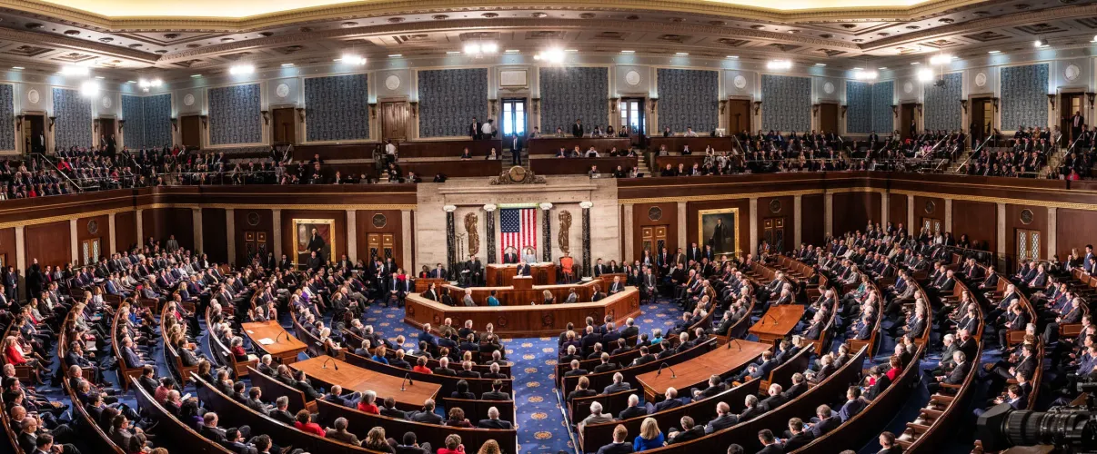 The interior of the United States Senate chamber with rows of desks