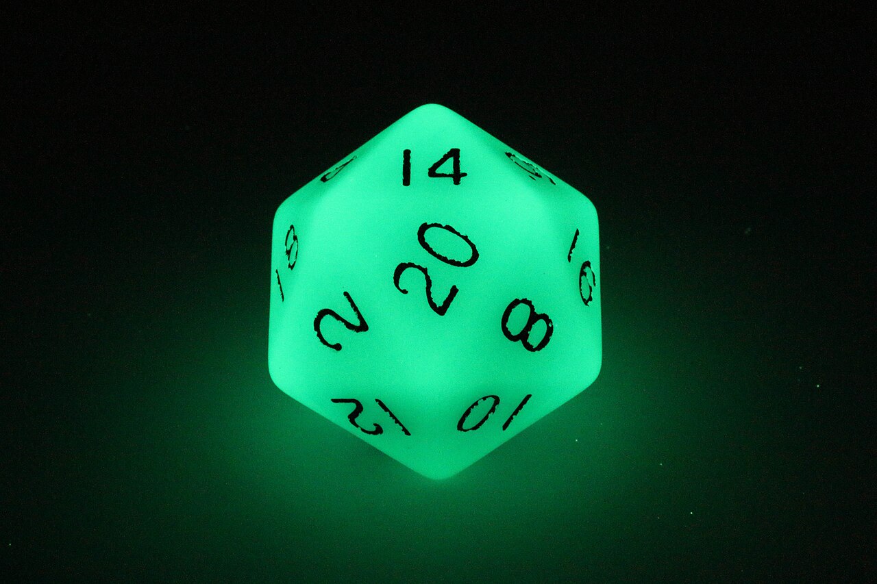A glow-in-the-dark twenty-sided die for use in tabletop roleplaying games