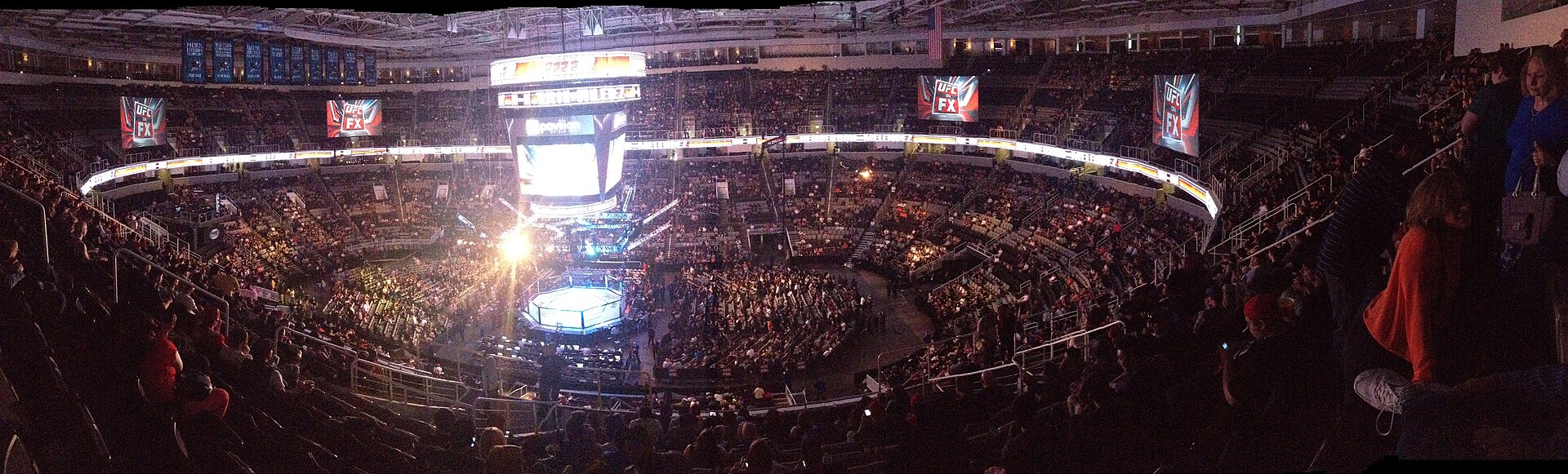 A UFC event inside the Octagon under the lights