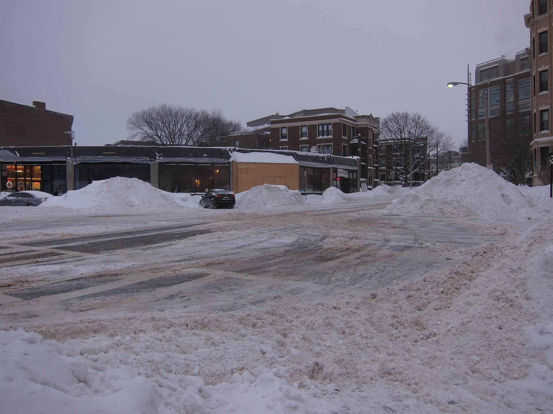 Snow piled high on a Boston street after a blizzard