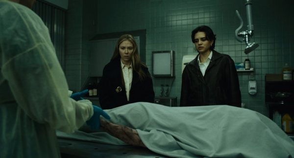 Julie Miller and Gina examine a body in a morgue in The Exorcist: Martyrs
