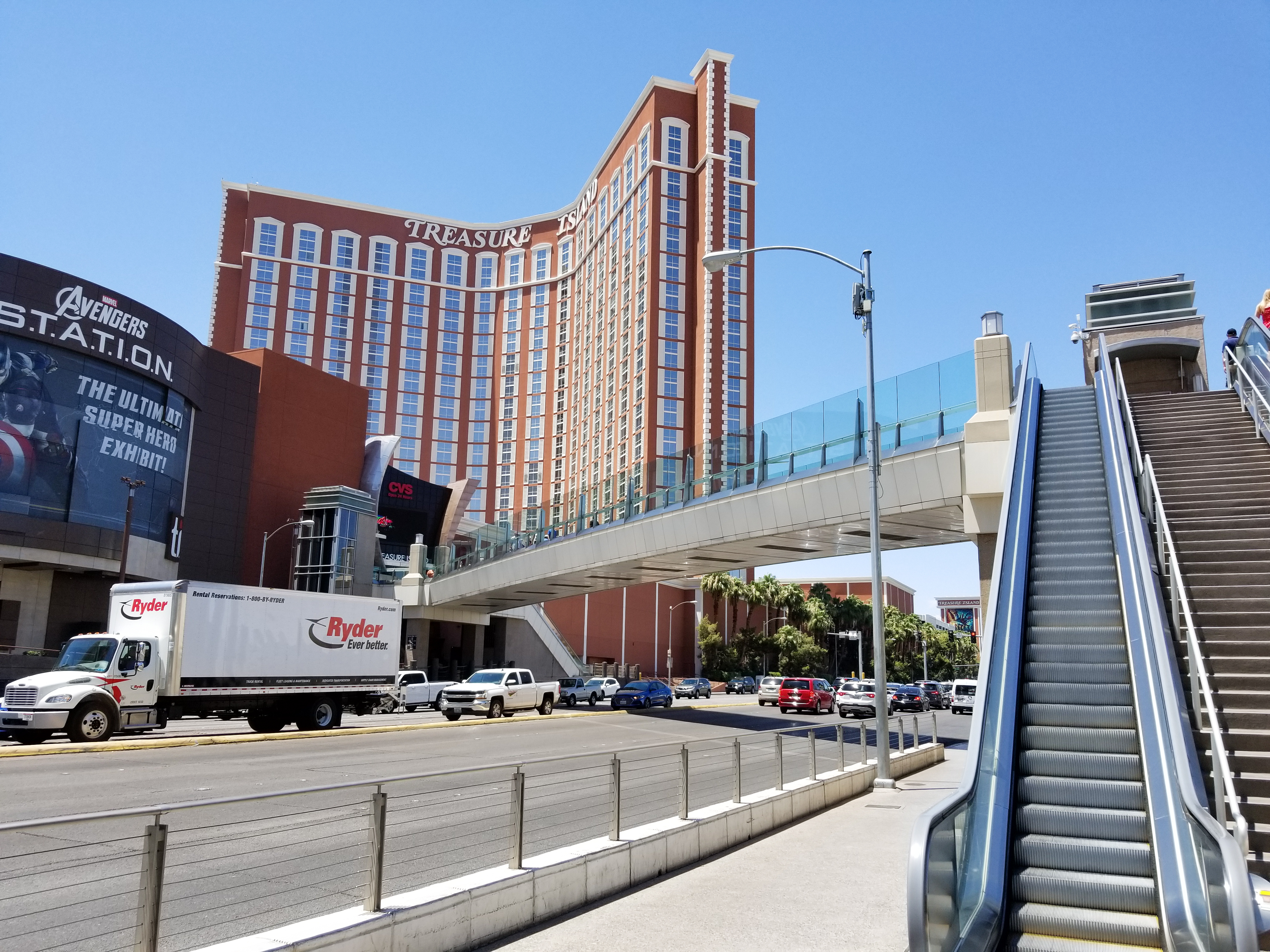 A pedestrian bridge over Las Vegas Boulevard in bright daylight