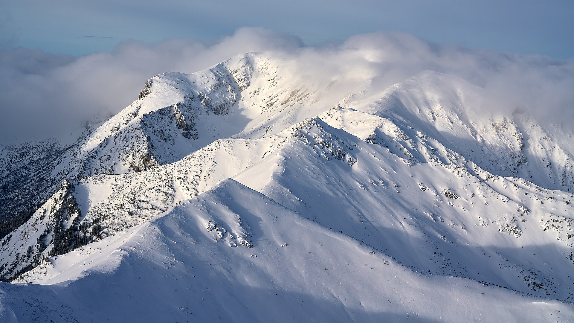 Snow-covered peaks in the Tatry Mountains — Dark Arisen's new Norgan region heads north into frozen territory