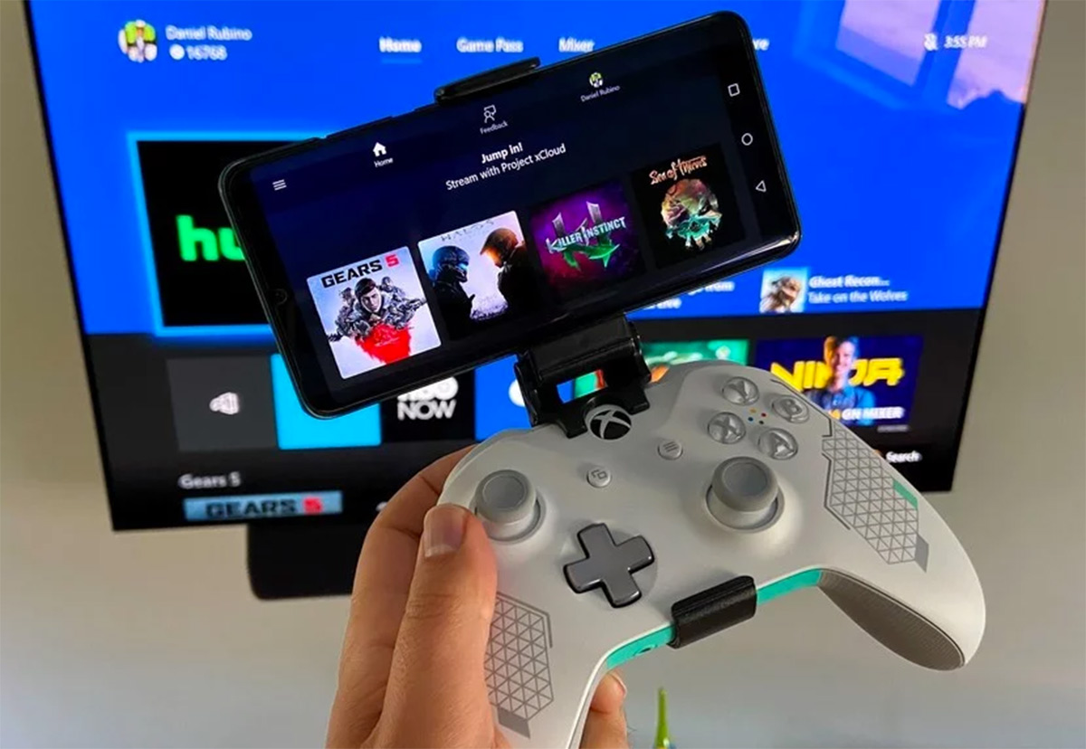 A phone mounted on a controller streaming a game