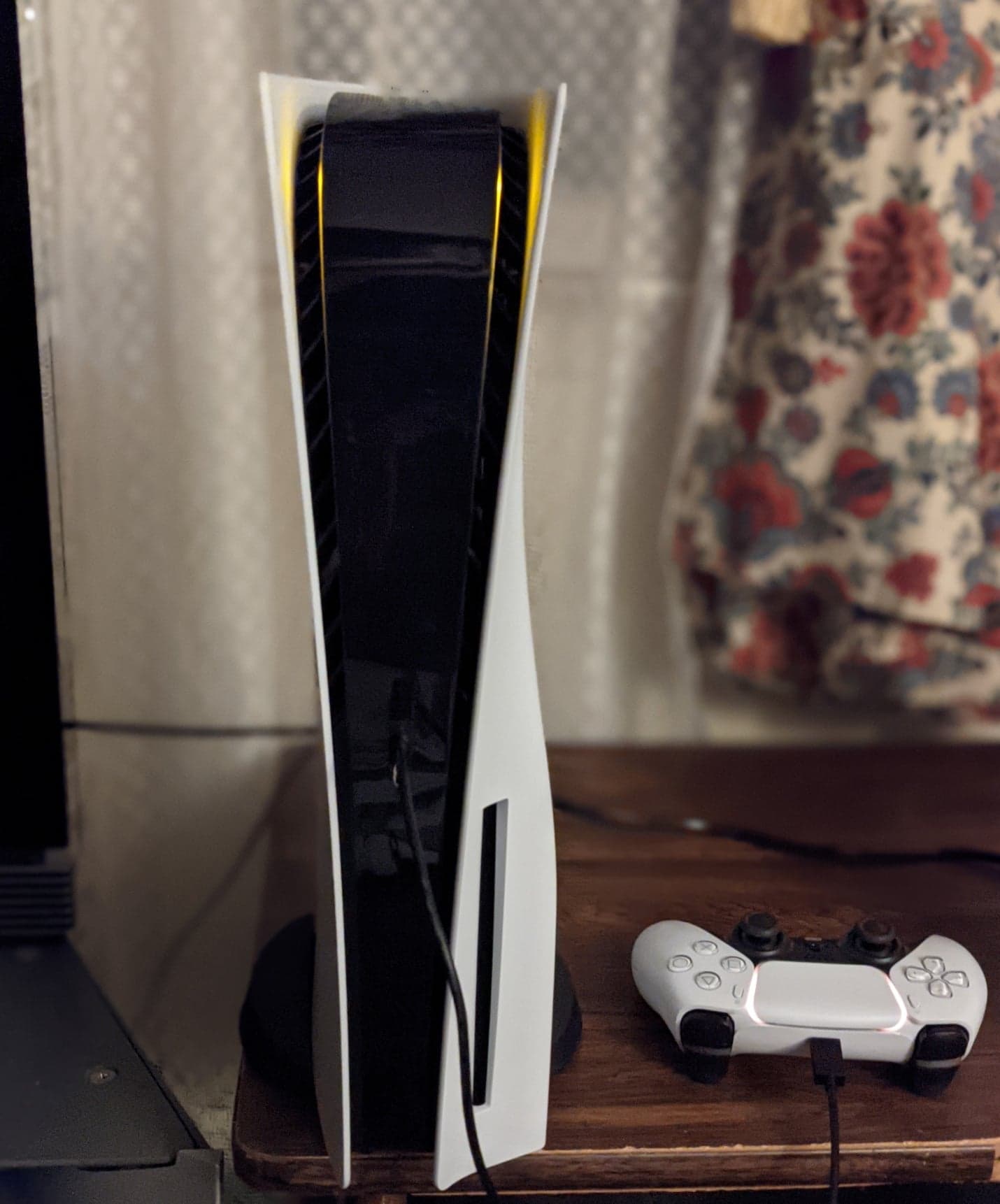 A PlayStation 5 console and DualSense controller — Rockstar says the GTA 6 launch trailer was captured entirely in-game on PS5