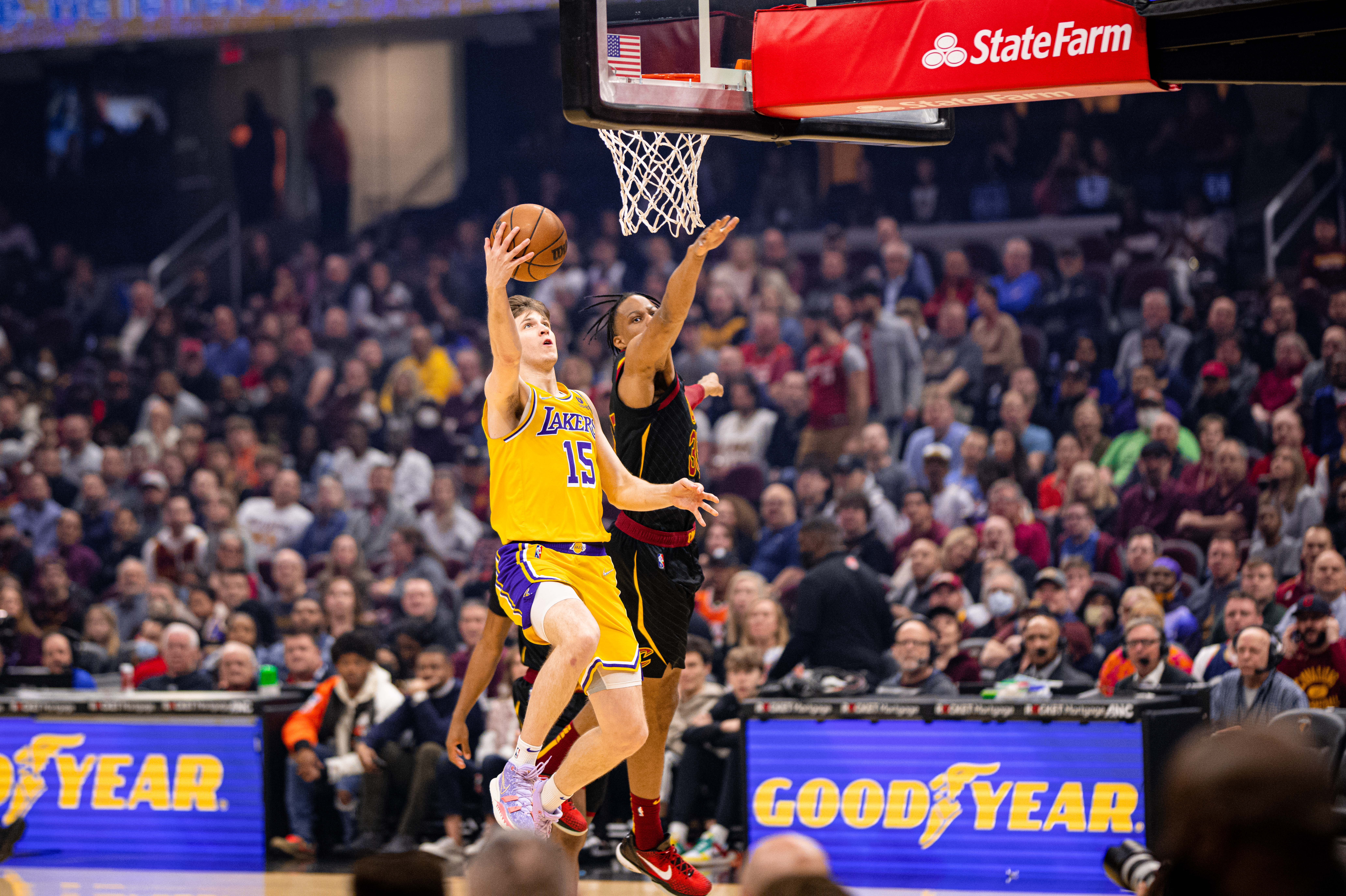 Austin Reaves of the Los Angeles Lakers driving with the ball during a game