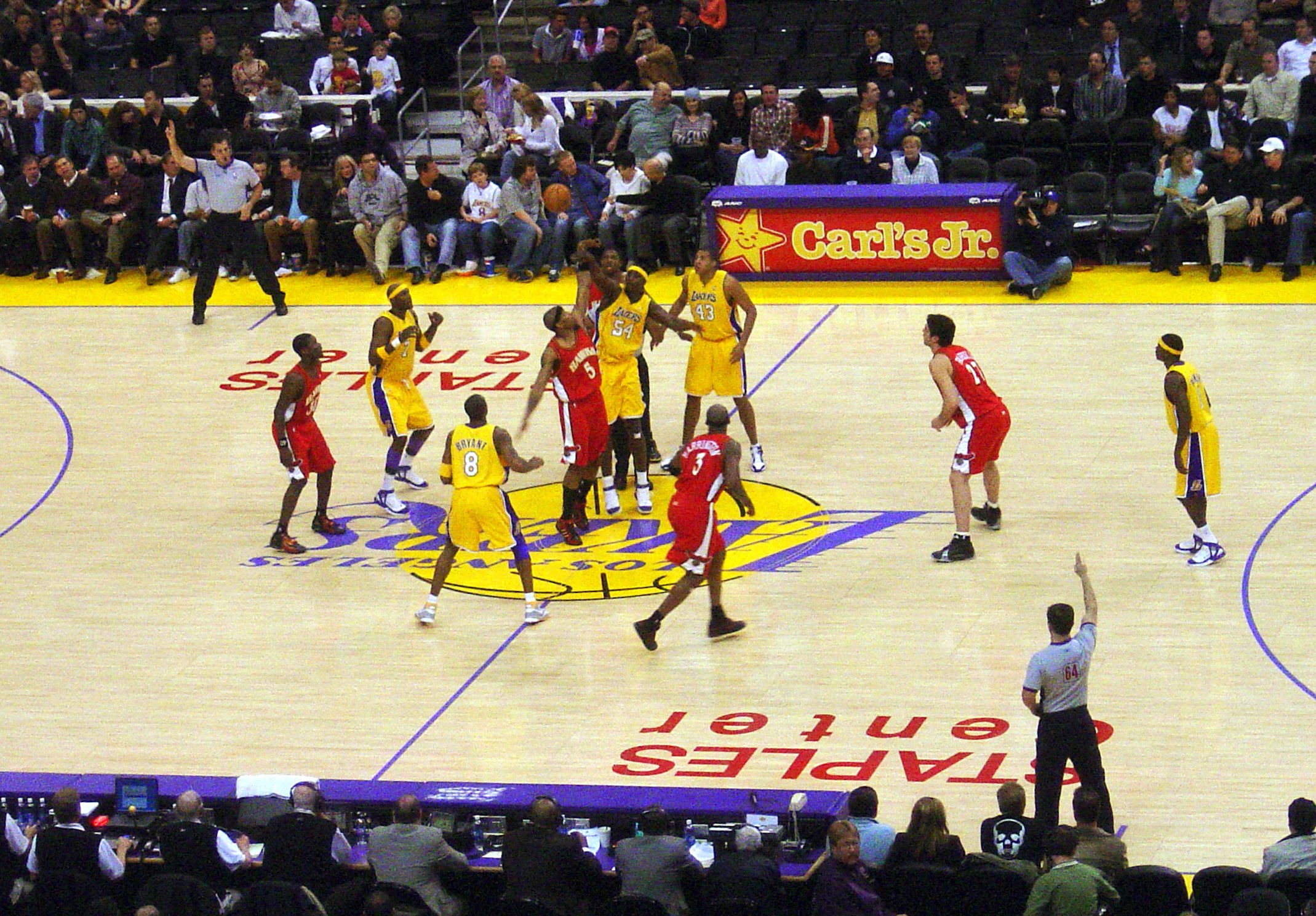 Lakers players in action on the court during a game at Crypto.com Arena
