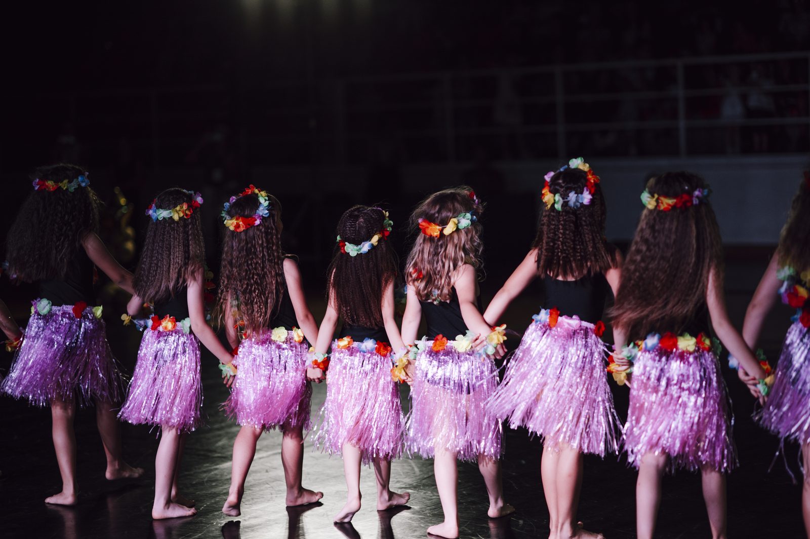 Young hula dancers preparing to perform. File photo.
