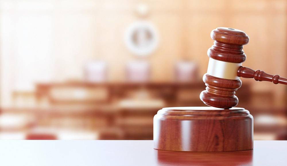 A judge's gavel in a courtroom