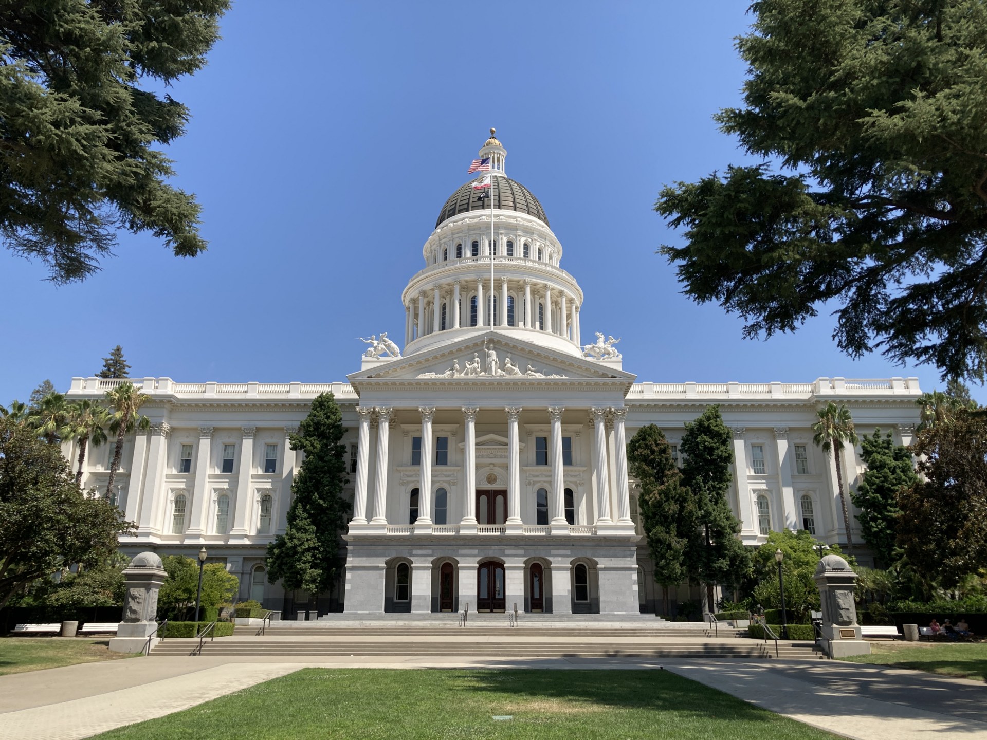 The California State Capitol in Sacramento on a bright summer day