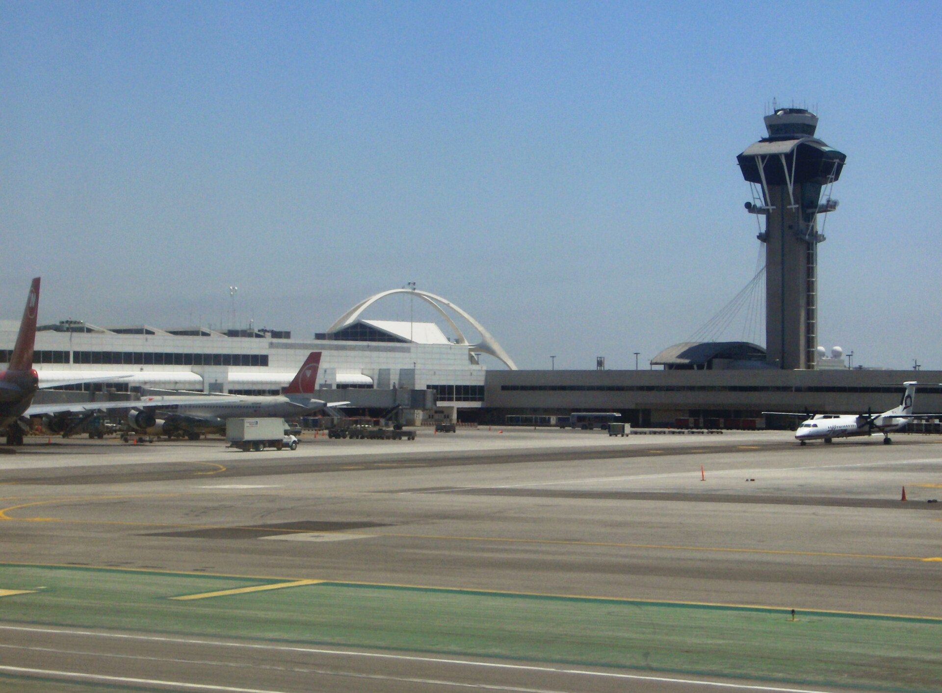 Aircraft on the tarmac at Los Angeles International Airport on a sunny day
