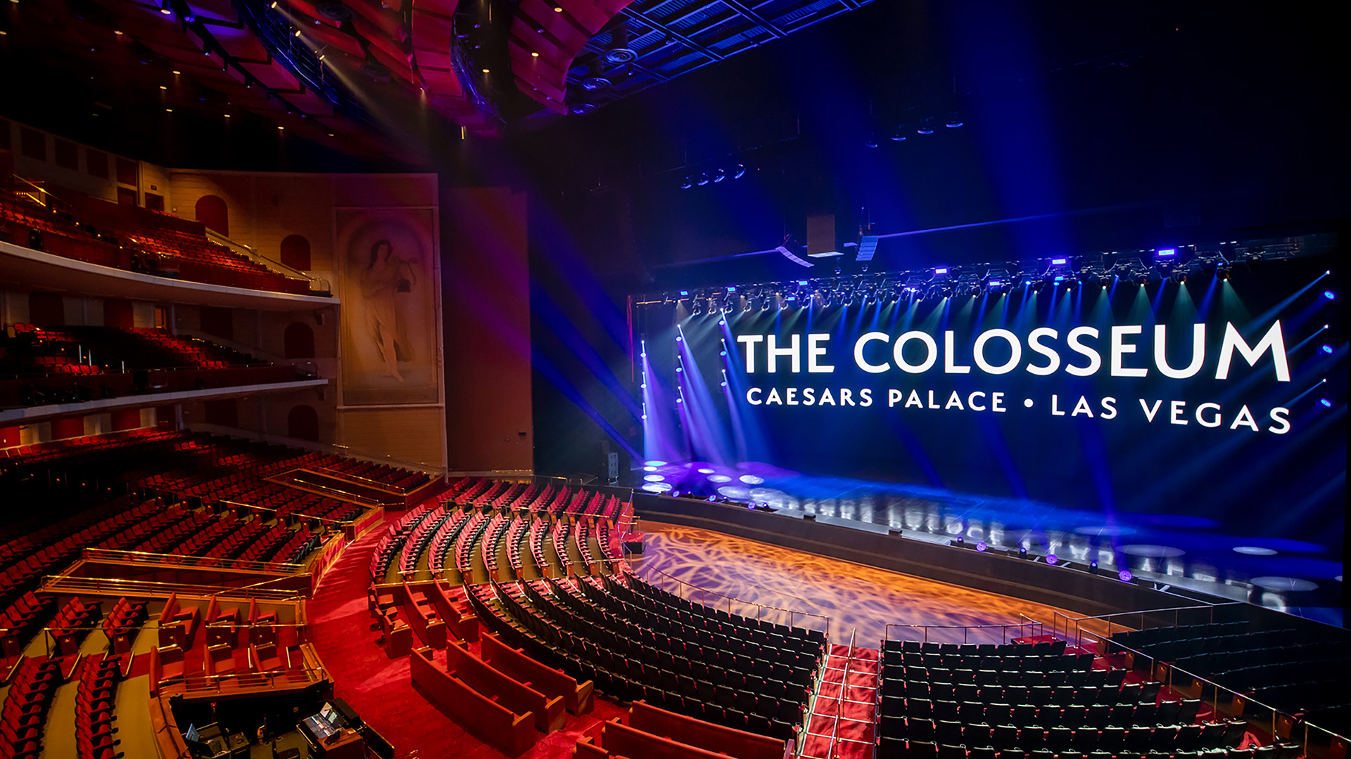 The interior of The Colosseum at Caesars Palace with its name on the stage screen