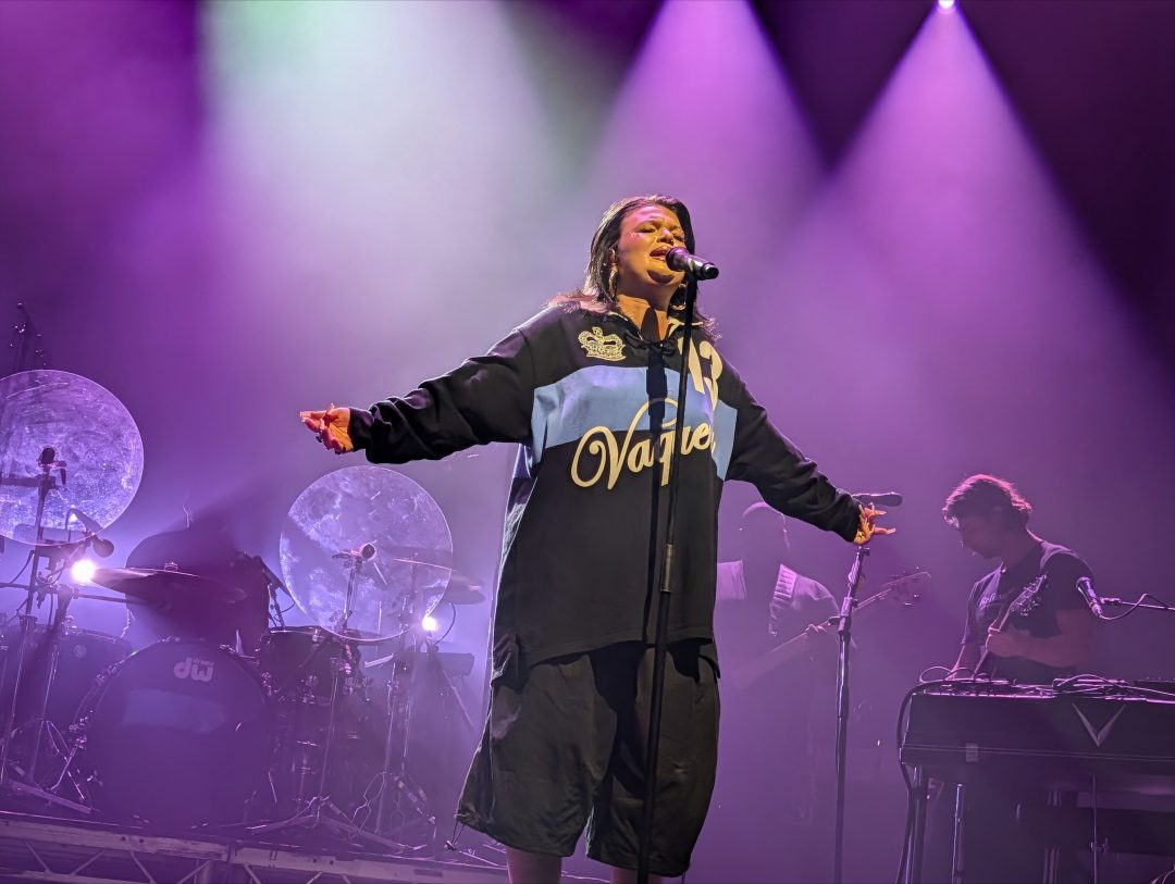 Lola Young performs live on stage