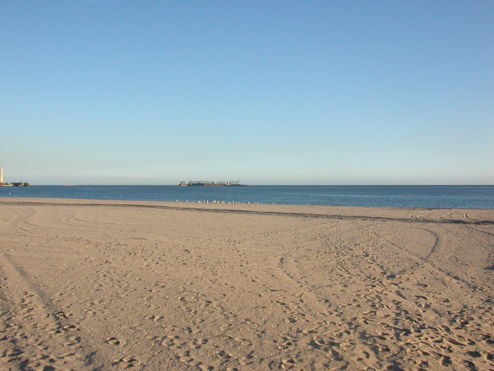 A bright, calm morning on the beach in Long Beach, California