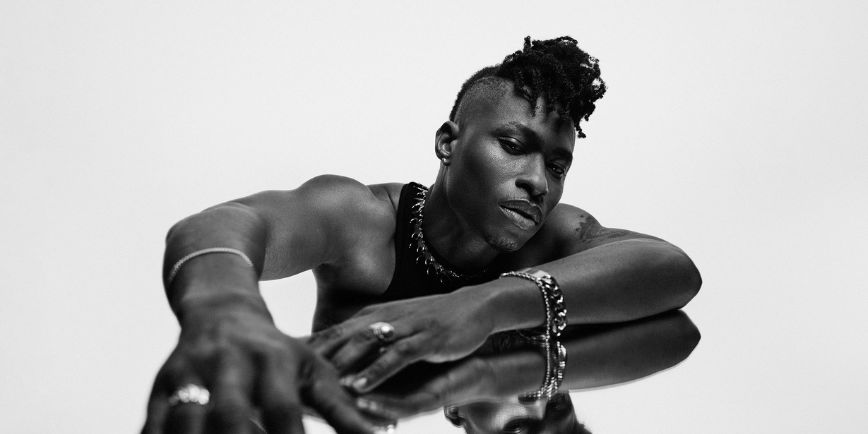 Lucky Daye in a black-and-white portrait