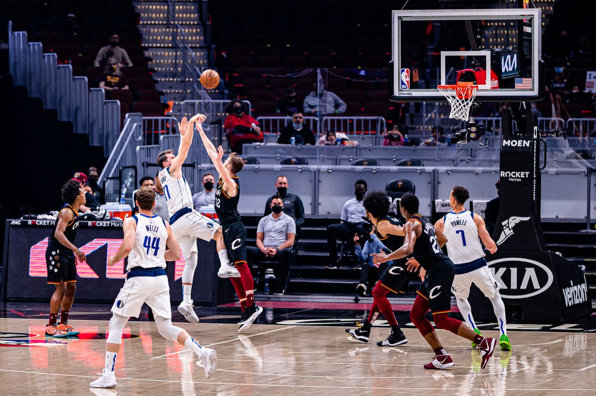 Luka Doncic handling the ball in a Lakers uniform