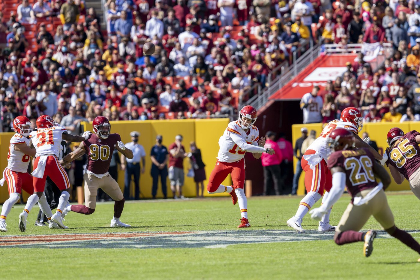 Patrick Mahomes releasing a throw during a game