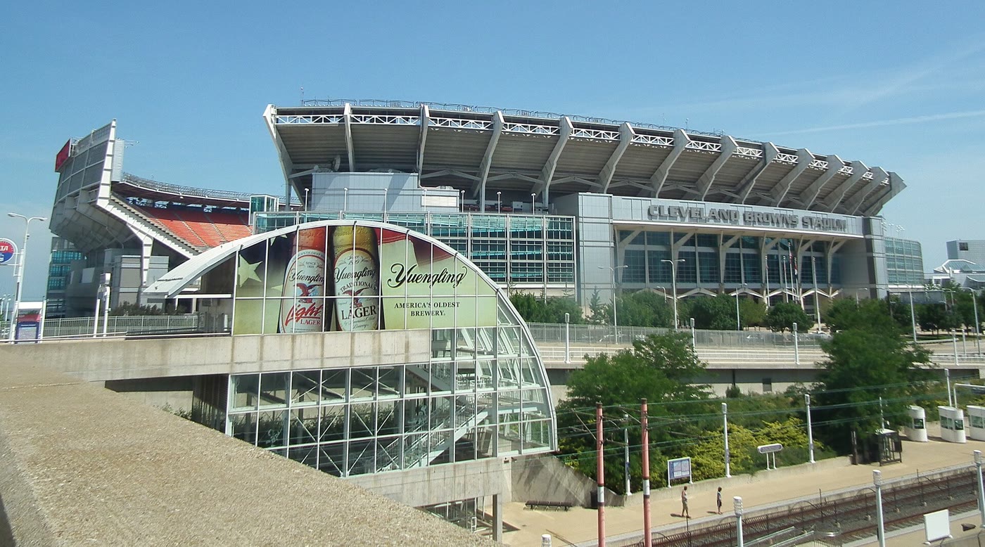 A packed football stadium in daylight — file photo