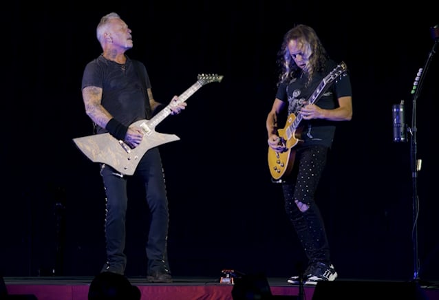 Metallica performing under the wraparound screen at Sphere on opening night