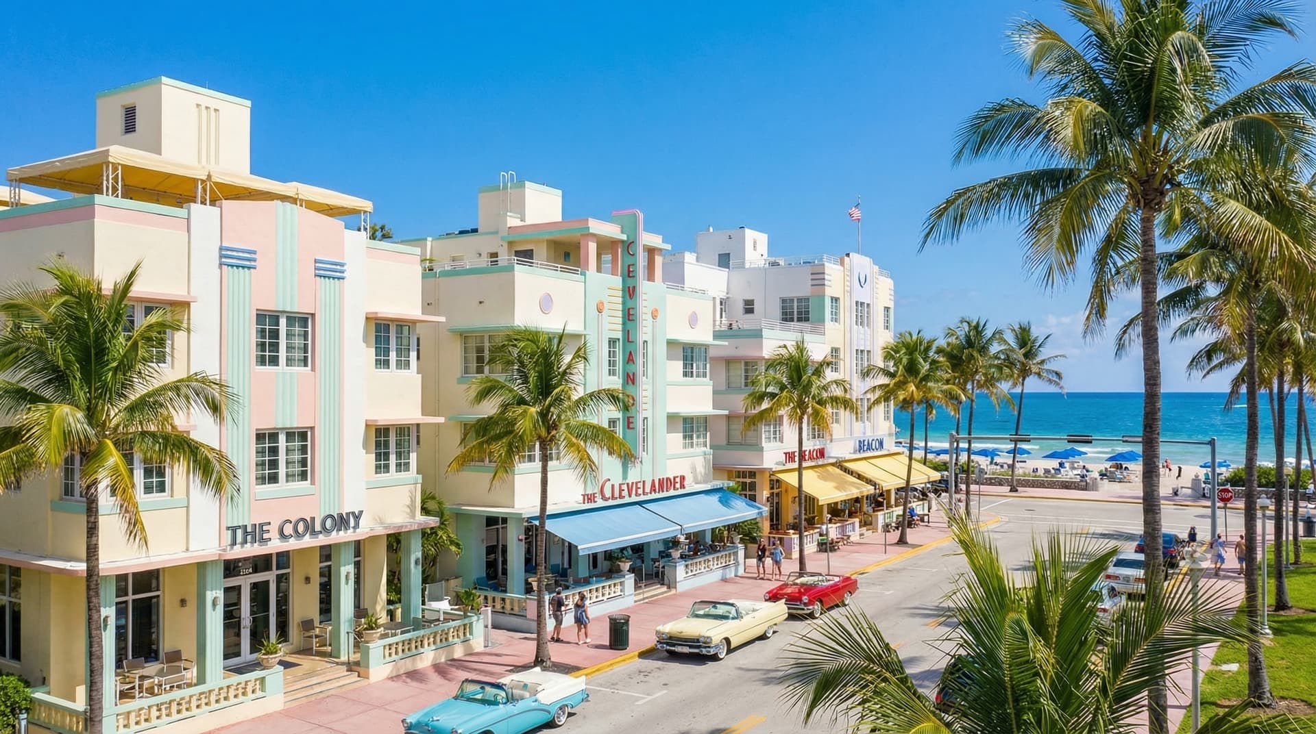 Ocean Drive in Miami Beach, lined with pastel art-deco hotels under a blue sky
