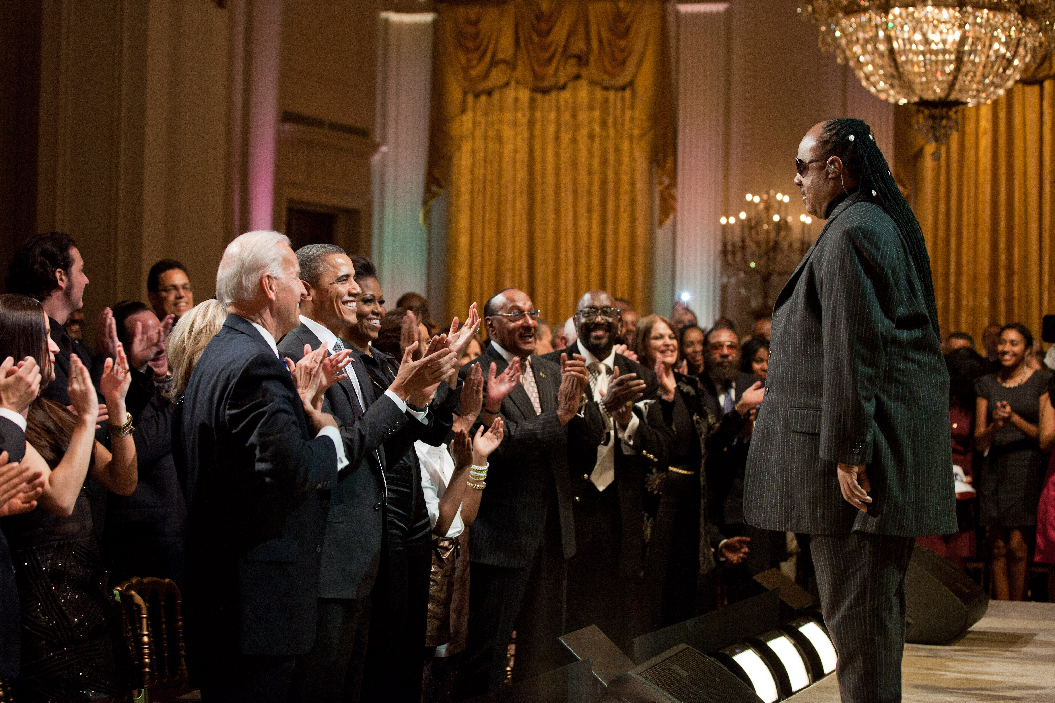 Stevie Wonder receiving a standing ovation in the East Room of the White House, 2011, during a Motown tribute concert