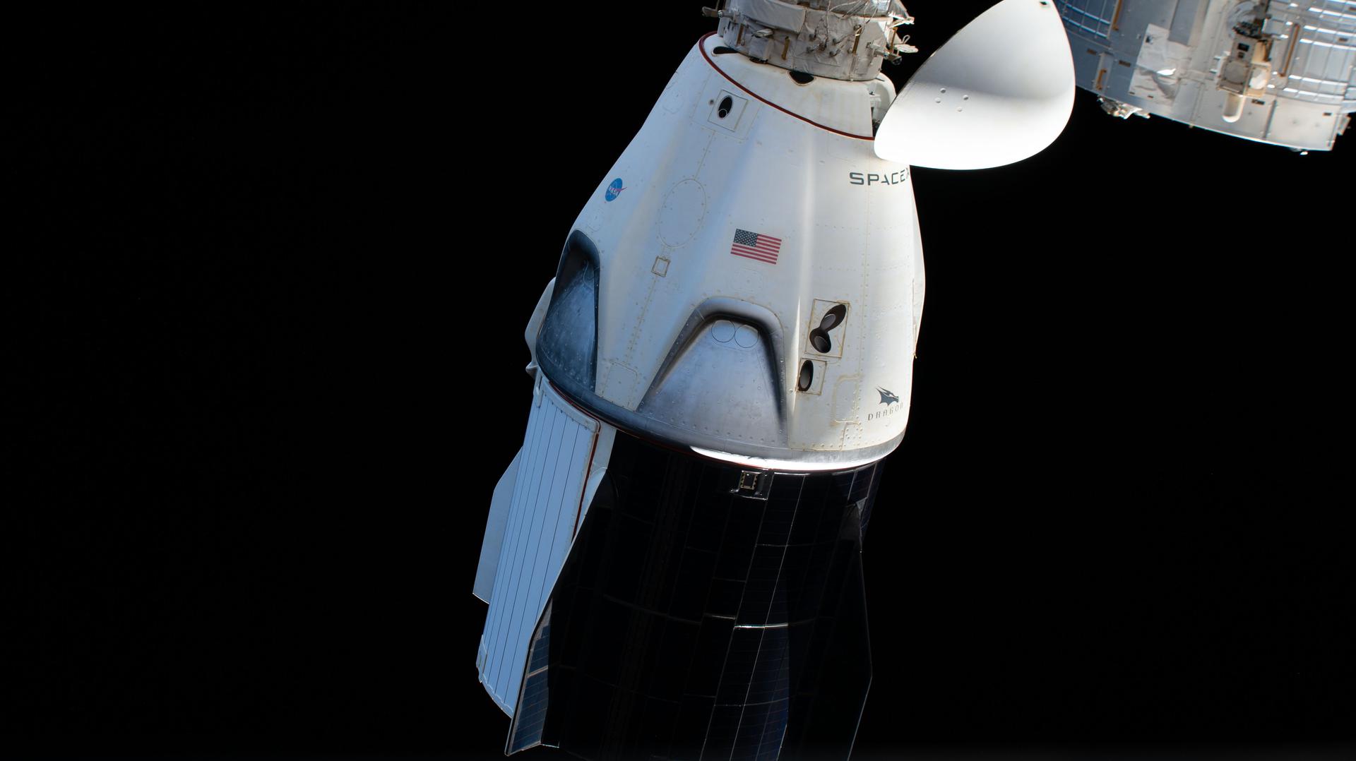 A SpaceX Dragon capsule shortly before undocking from the space station