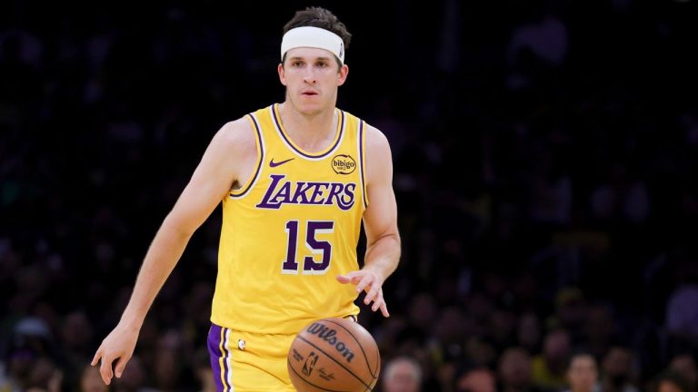 Austin Reaves in a Lakers uniform — cleared and back on the floor after missing two preseason games with a tweaked ankle
