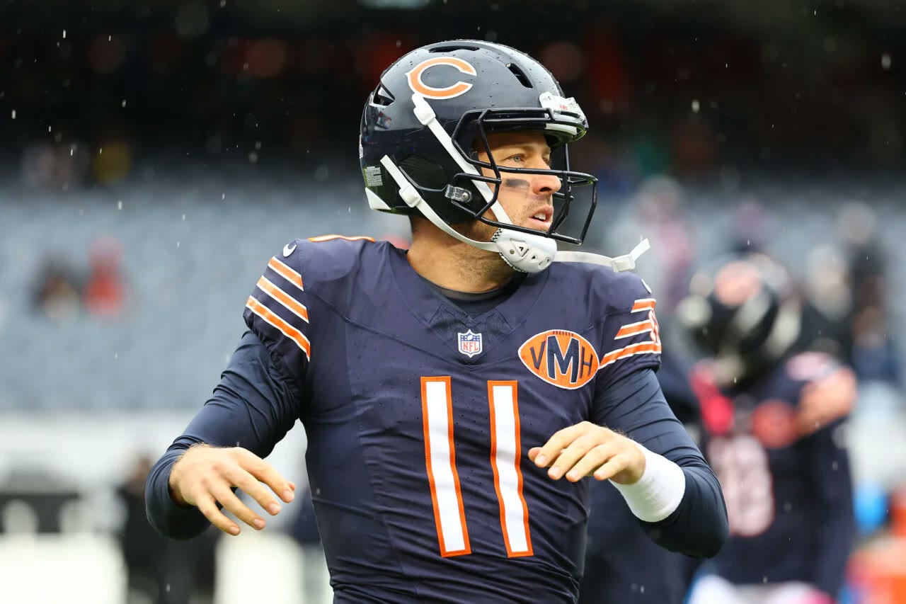 Chicago Bears quarterback Case Keenum (11) in the navy home uniform during a game.