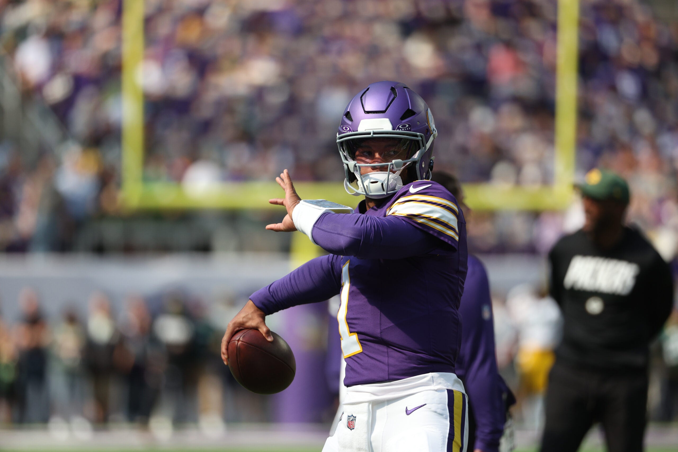Minnesota Vikings quarterback Kyler Murray (1) throws during a game at U.S. Bank Stadium.