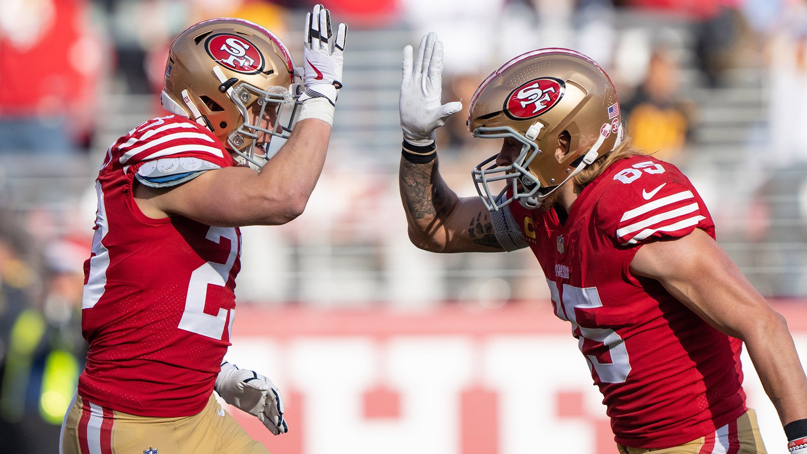 49ers Christian McCaffrey and George Kittle celebrate a touchdown