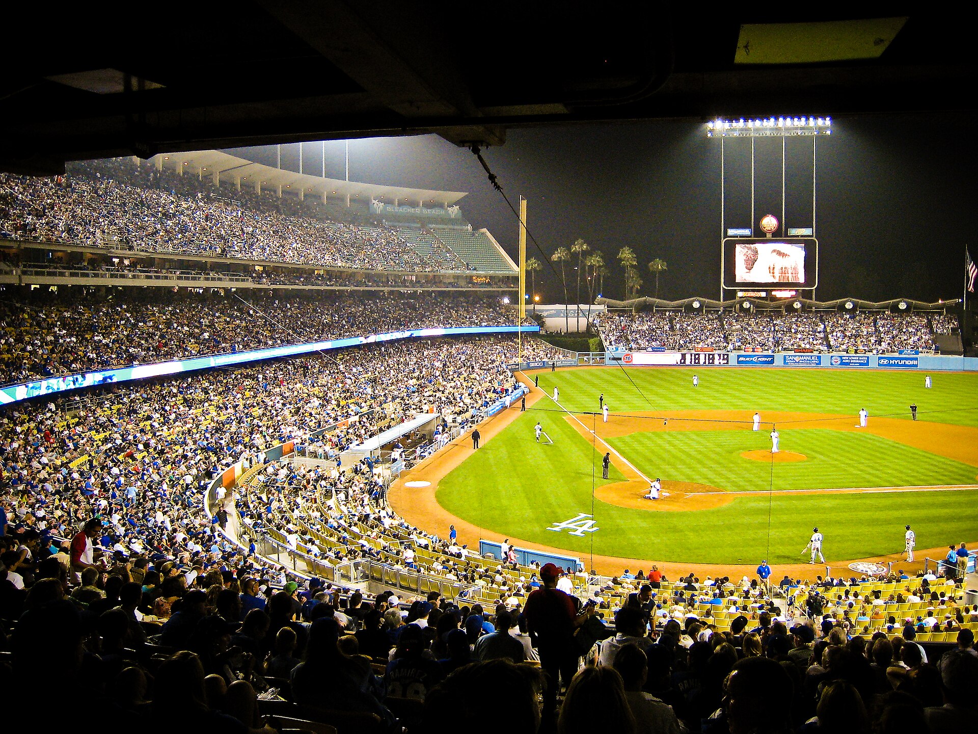 Dodger Stadium packed at night — the series shifts to Los Angeles for Games 3 through 5