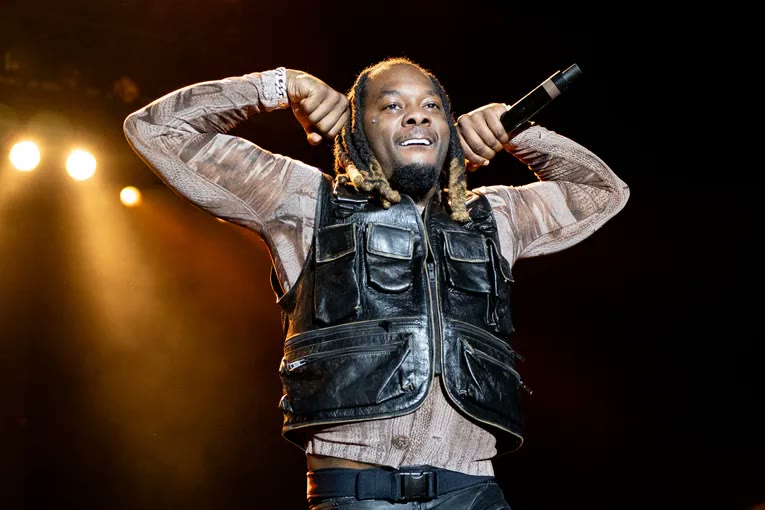 Offset performing on stage