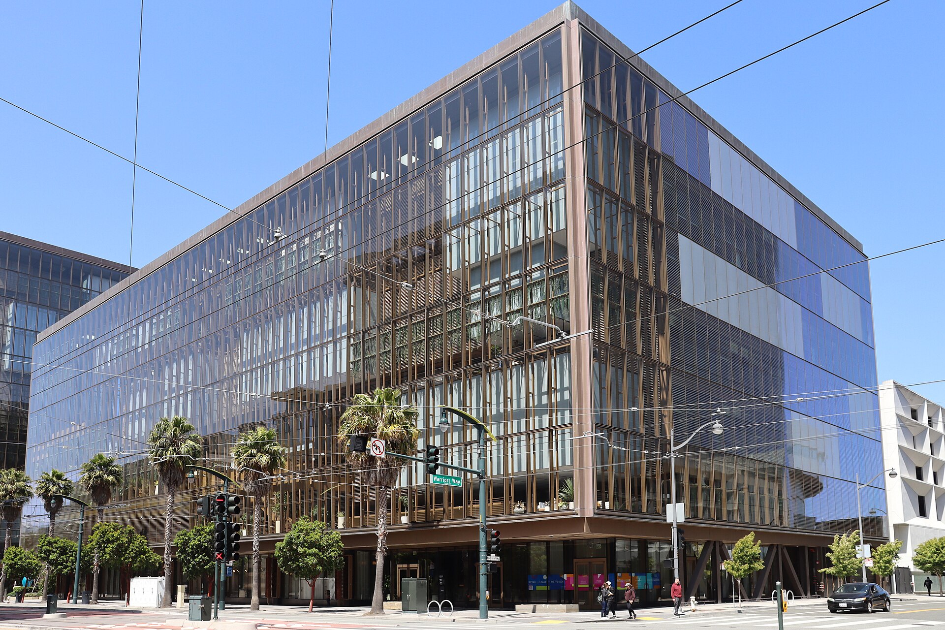 OpenAI’s current headquarters, a modern glass office building at 1515 Third Street in San Francisco’s Mission Bay.