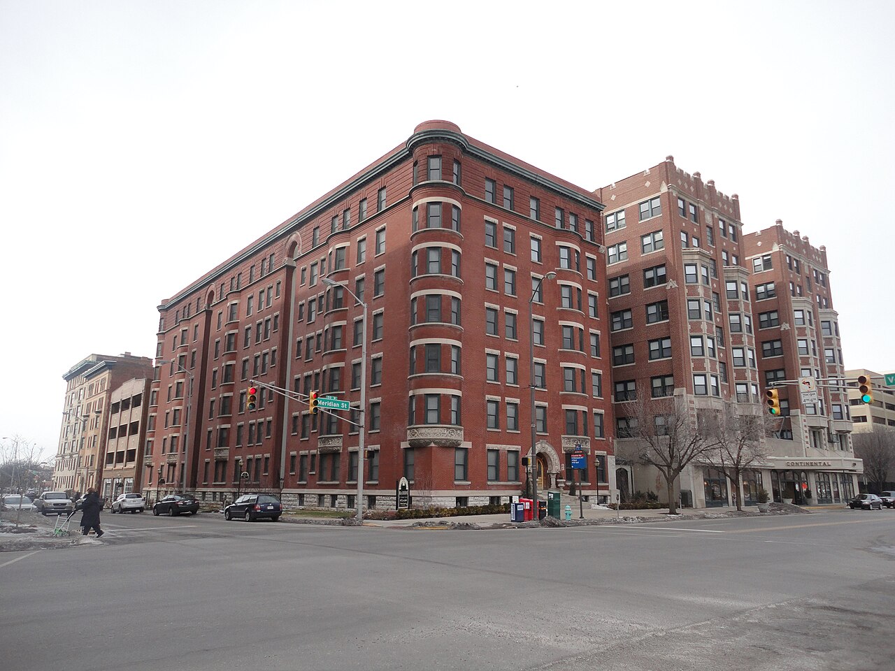 Modern garden-style apartment buildings in warm daylight