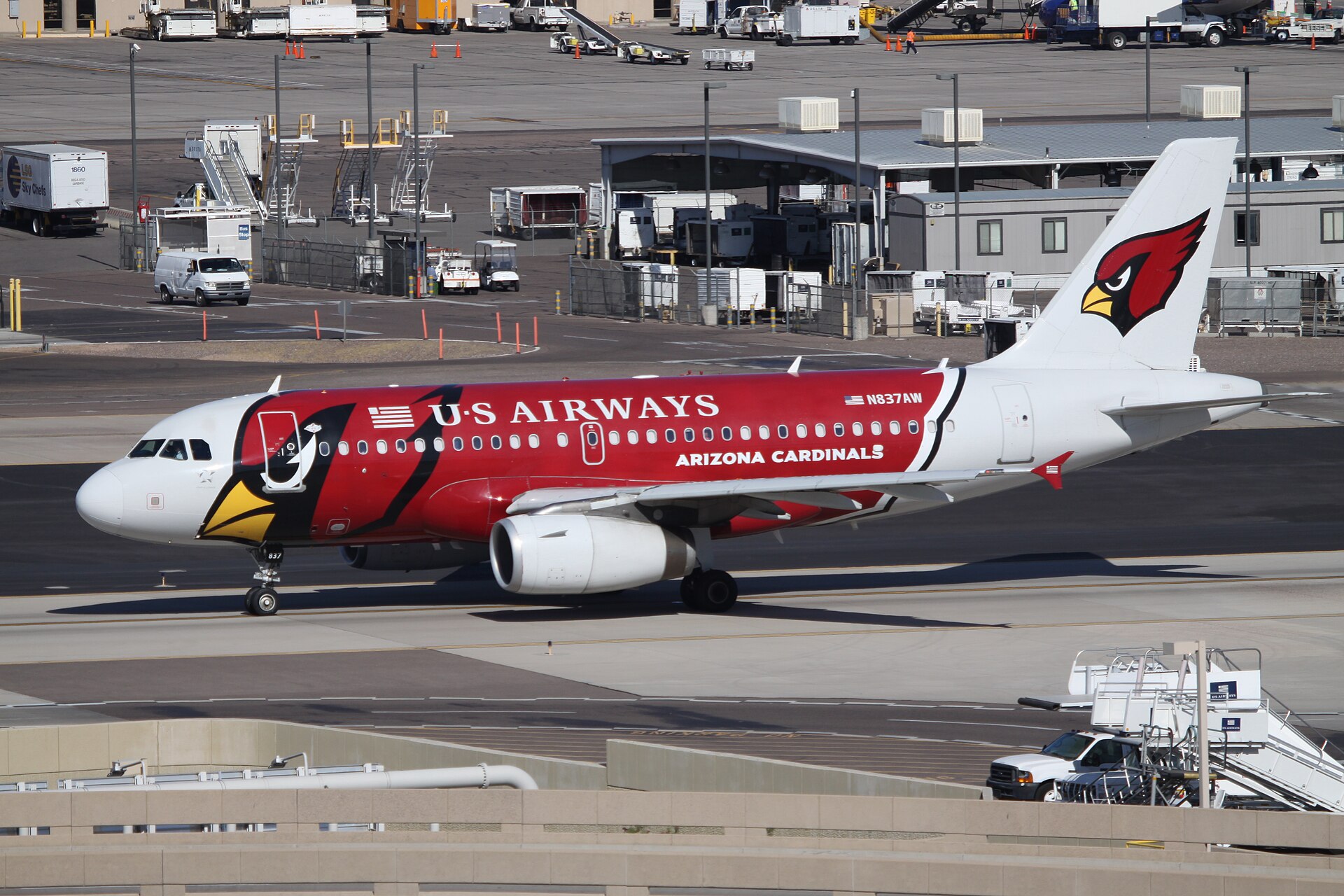 An airliner in Arizona Cardinals colors at Phoenix Sky Harbor