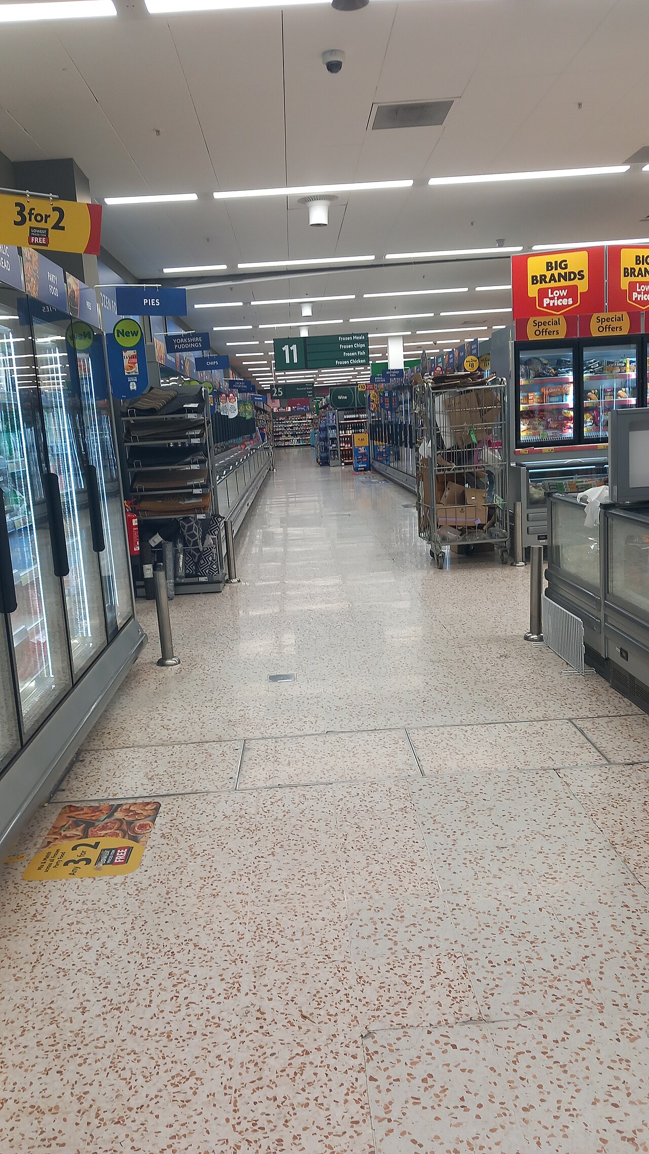 A brightly lit supermarket aisle at a Morrisons store in Inverness