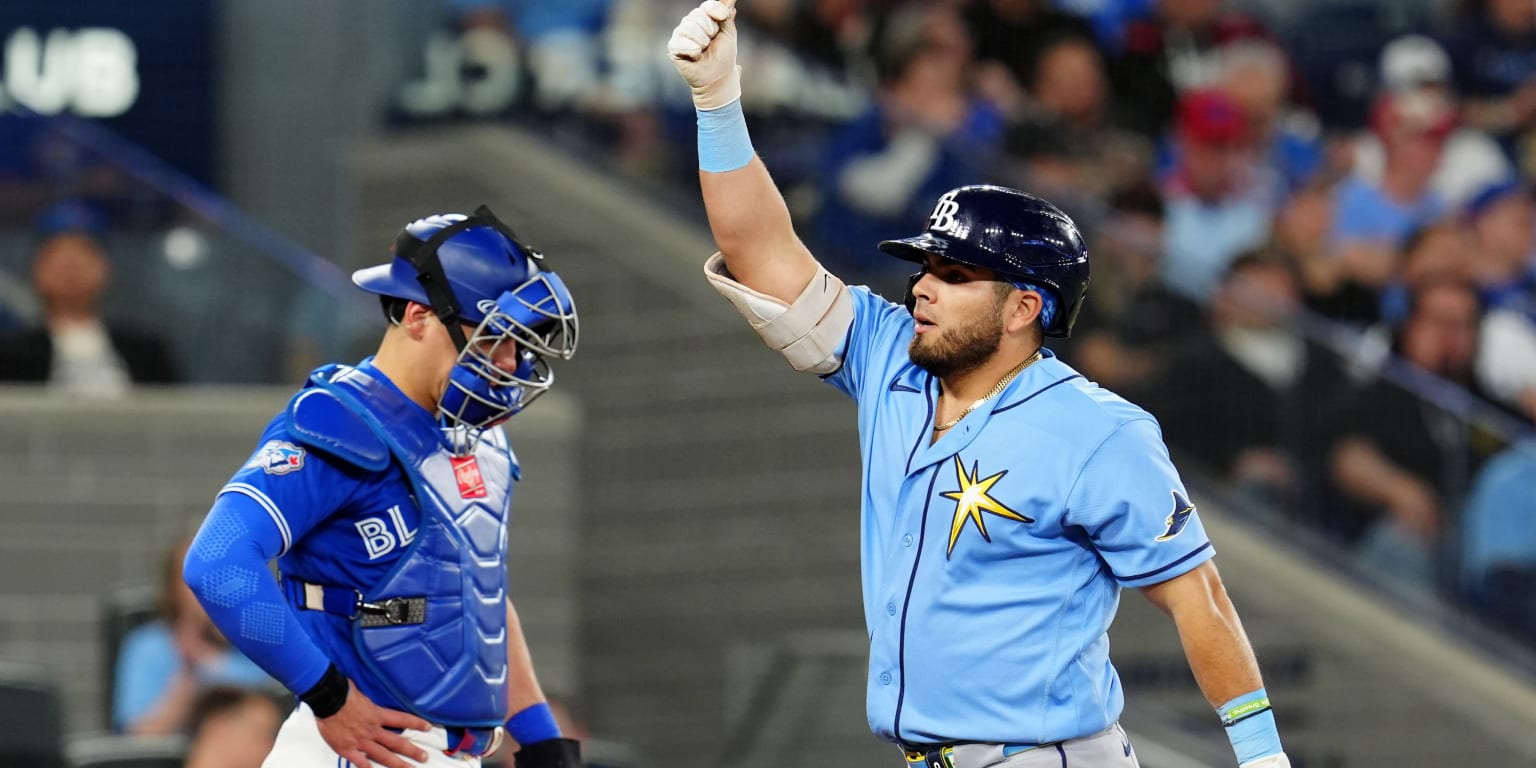 Tampa Bay Rays players celebrate during the 2026 ALDS against the New York Yankees at Tropicana Field — the Rays won Game 2, 5-2, to take a 2-0 series lead.