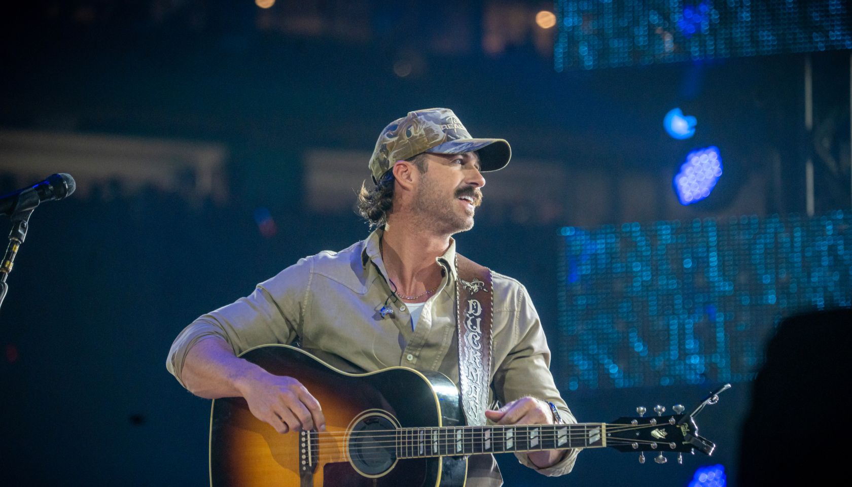 Riley Green performing on stage