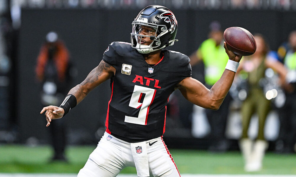 Michael Penix Jr. dropping back to pass for the Atlanta Falcons