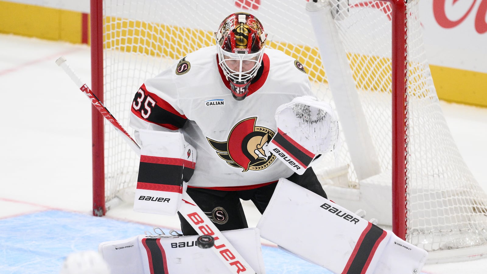 Ottawa Senators goaltender Linus Ullmark guards the net against the Boston Bruins — Ullmark stopped all 10 shots he faced through two periods before leaving Monday's game after a second-period collision.