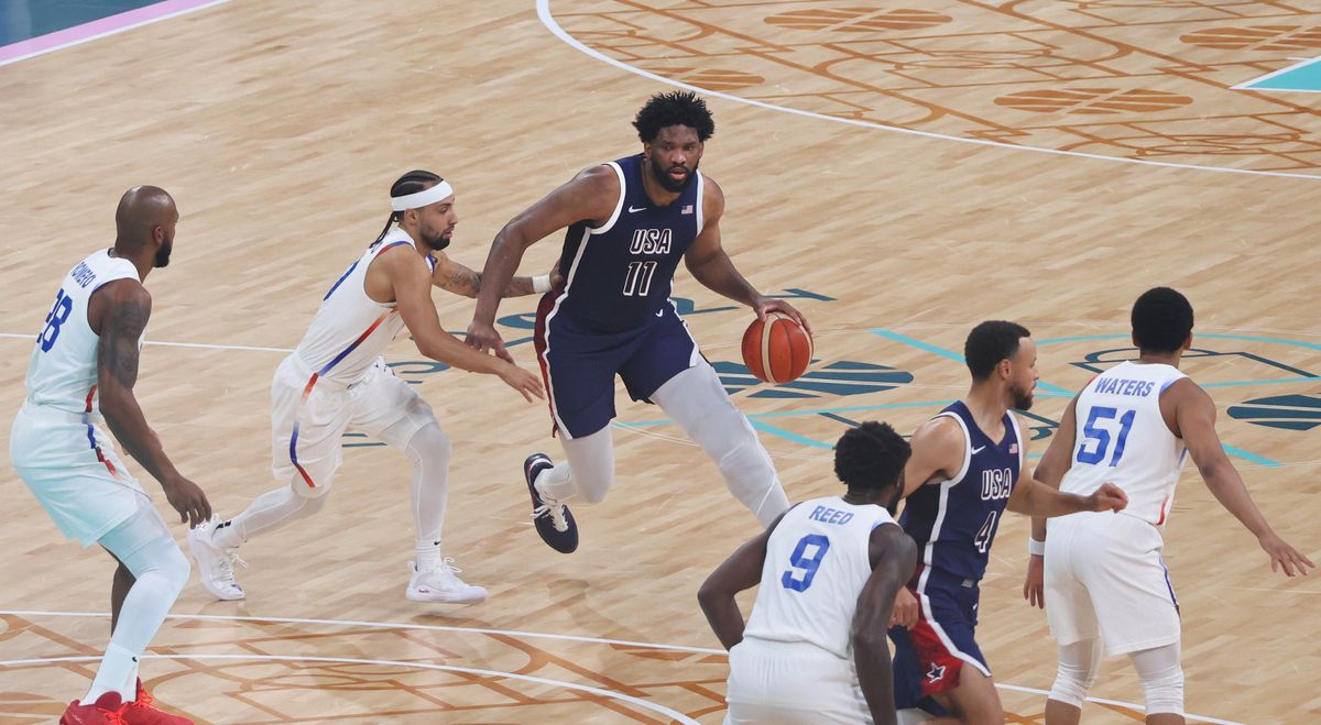 LeBron James and Joel Embiid together in USA uniforms at the 2024 Olympics
